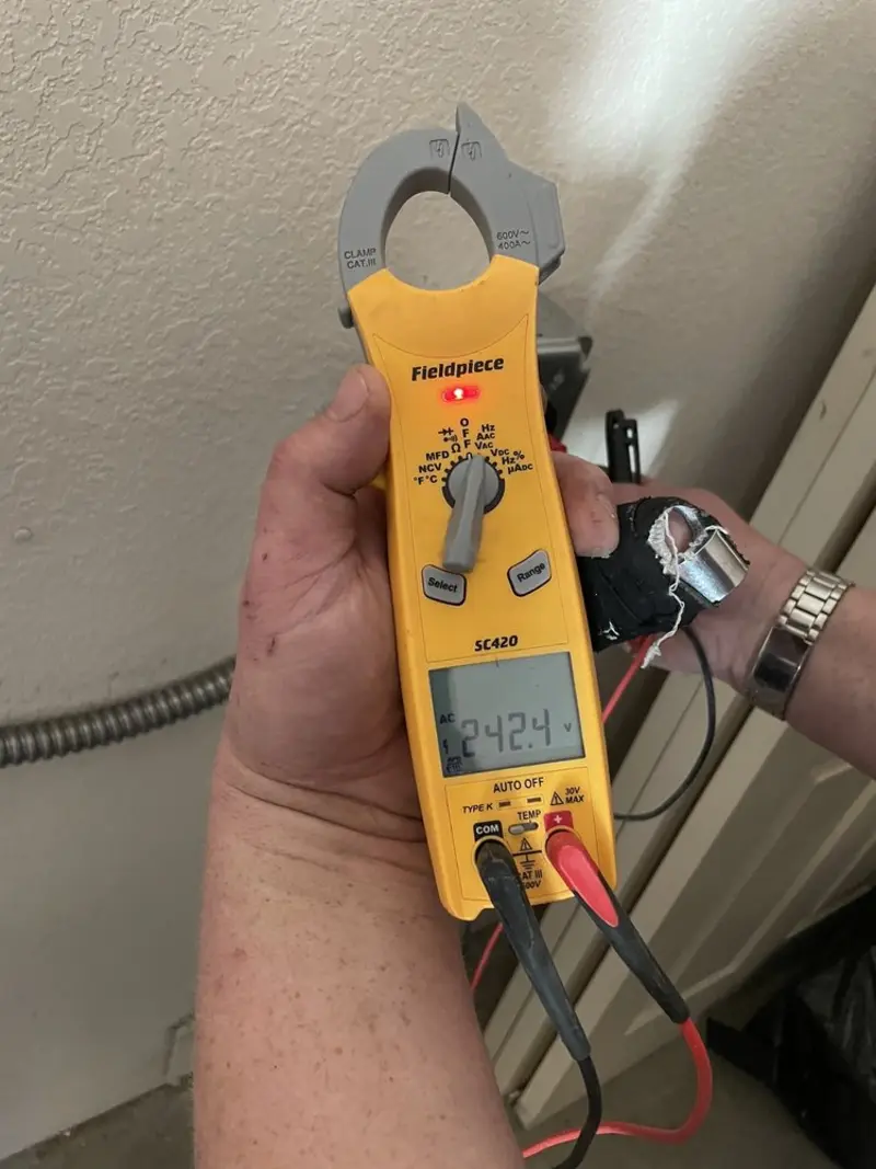 Voltage testing with clamp meter during Ceiling Fan Installation in Lower Chichester